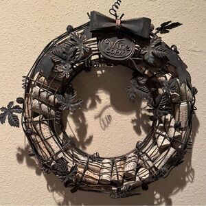 Charming Wine Cork Wreath with Black Metal Accents
